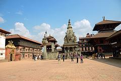 Kathmandu Bhaktapur 01-2 Bhaktapur Durbar Square With Golden Gate and Palace of 55 Windows on Left, King Bhupatindra Malla Column, Teleju Bell, Vatsala Durga Temple In Middle, Pashupatinath Temple On Right